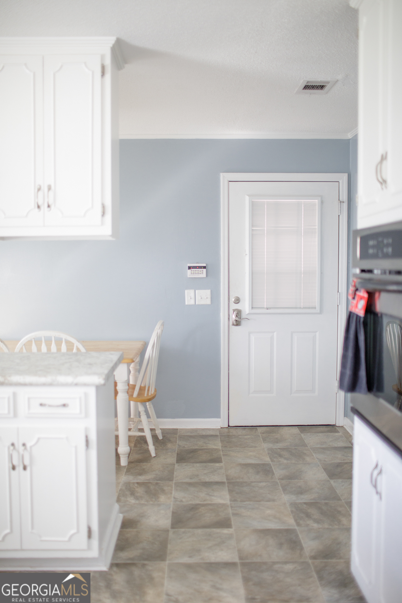 2110 Ware Street Blackshear, GA 31516 - Photo 17 of 57 a view of a kitchen with furniture and closet