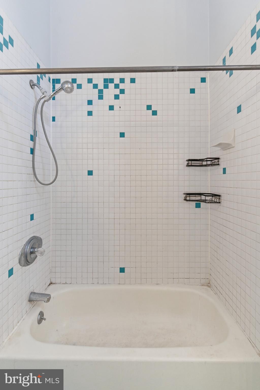 1401 Light Street Baltimore, MD 21230 - Photo 14 of 39 a bathroom with a shower and a shower