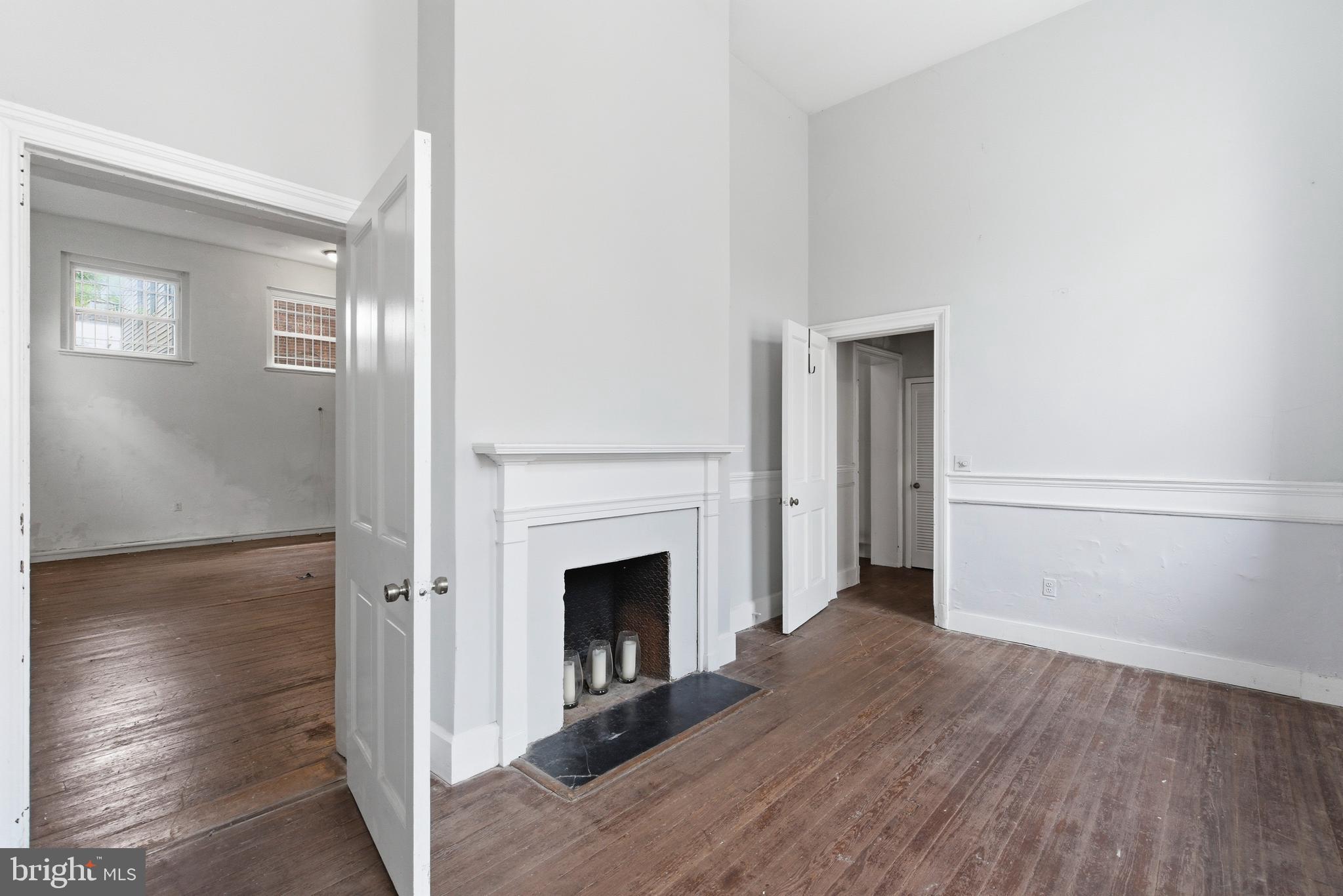 1401 Light Street Baltimore, MD 21230 - Photo 21 of 39 a view of a livingroom with wooden floor and a fireplace