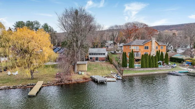 a view of a lake with a houses