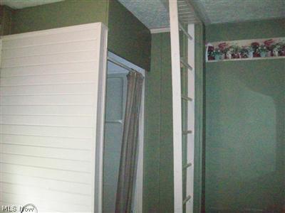 2001 Pontius Road Mogadore, OH 44260 - Photo 18 of 23 Also standing shower, very spacious full bath w/ linen closet on second floor. What looks like a ladder is a very clever towel rack!
