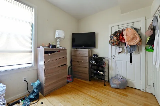 a room with furniture and a flat screen tv