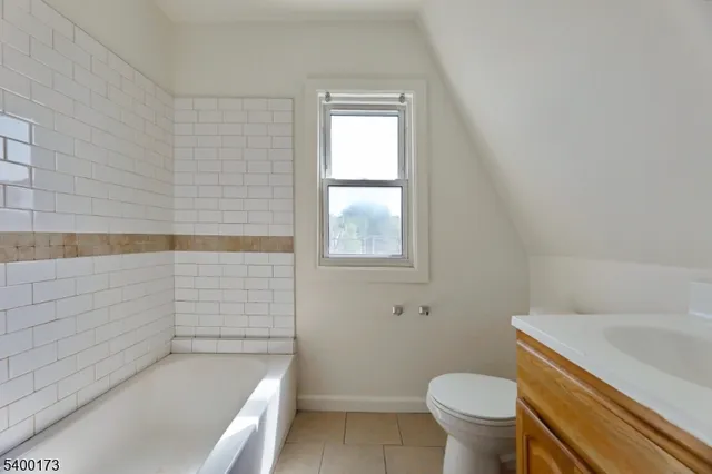 a bathroom with a sink and a bathtub