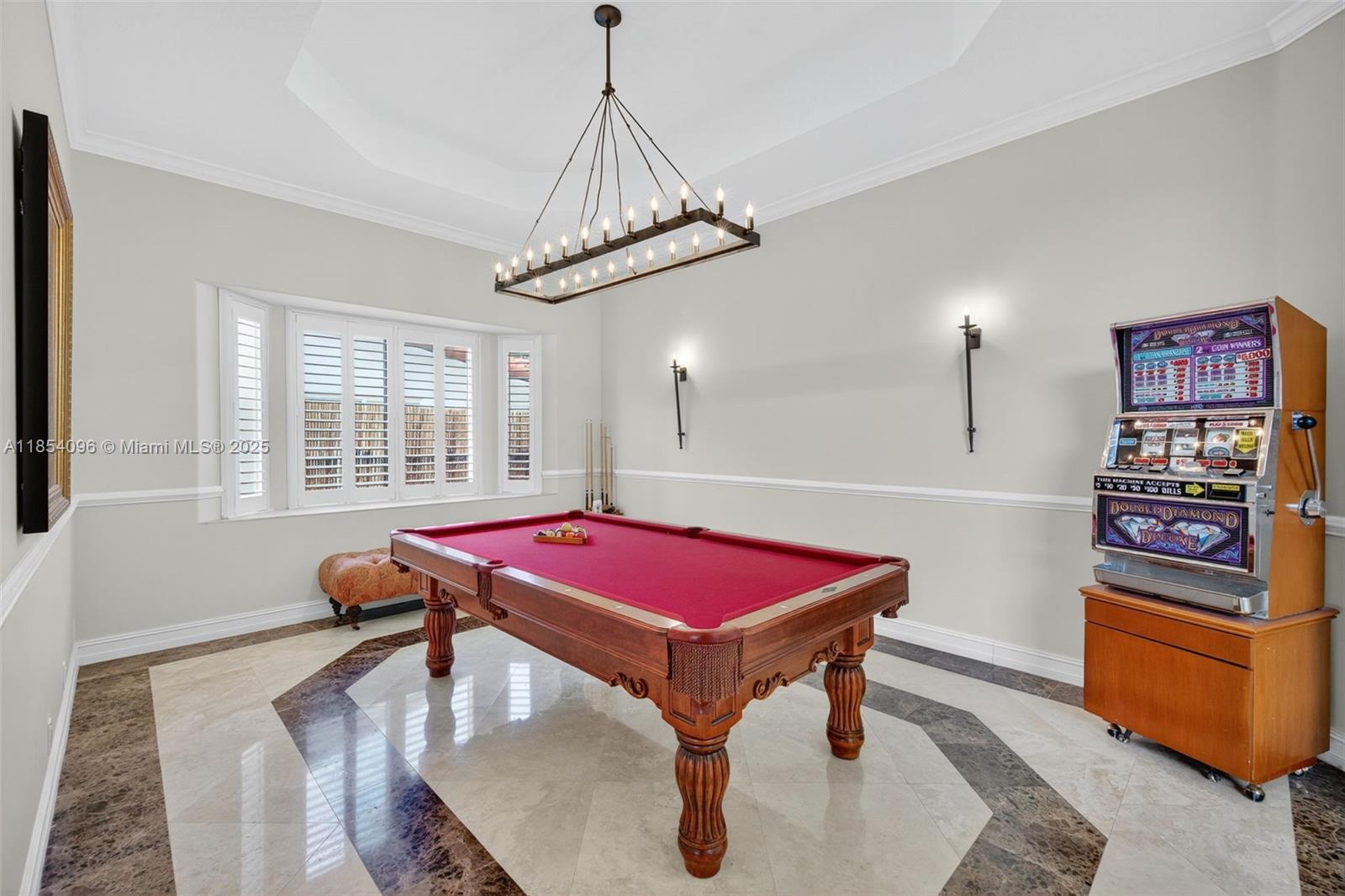 2649 Northeast 26th Avenue Lighthouse Point, FL 33064 - Photo 22 of 60 a room with furniture and window