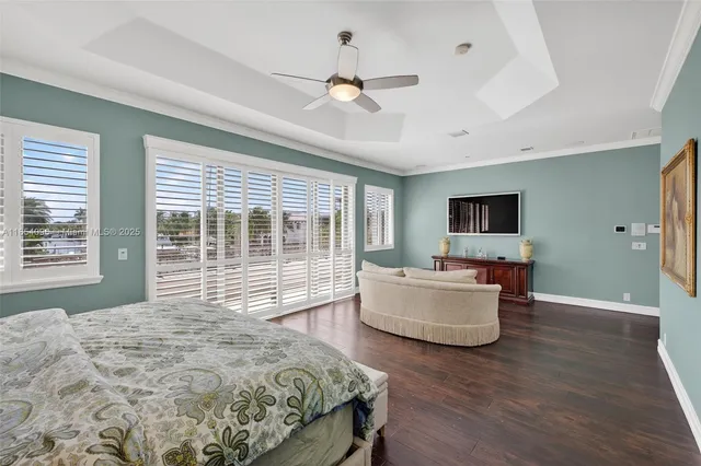 a large bathroom with a sink a large mirror and a shower