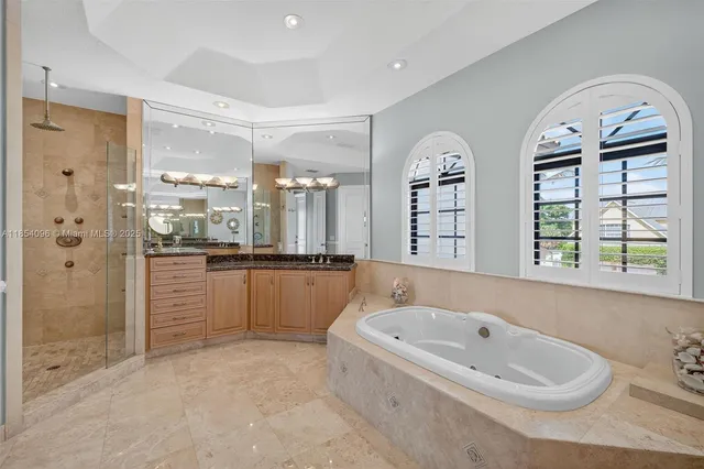 a room with wooden floor and pool table