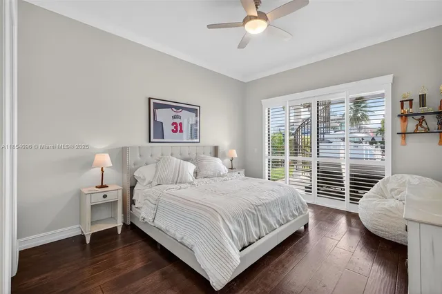 a view of a house with swimming pool and sitting area