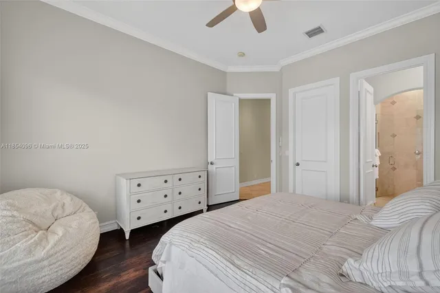 a view of a swimming pool and lounge chairs