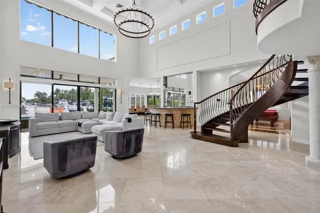 a view of a livingroom with dining room and couches