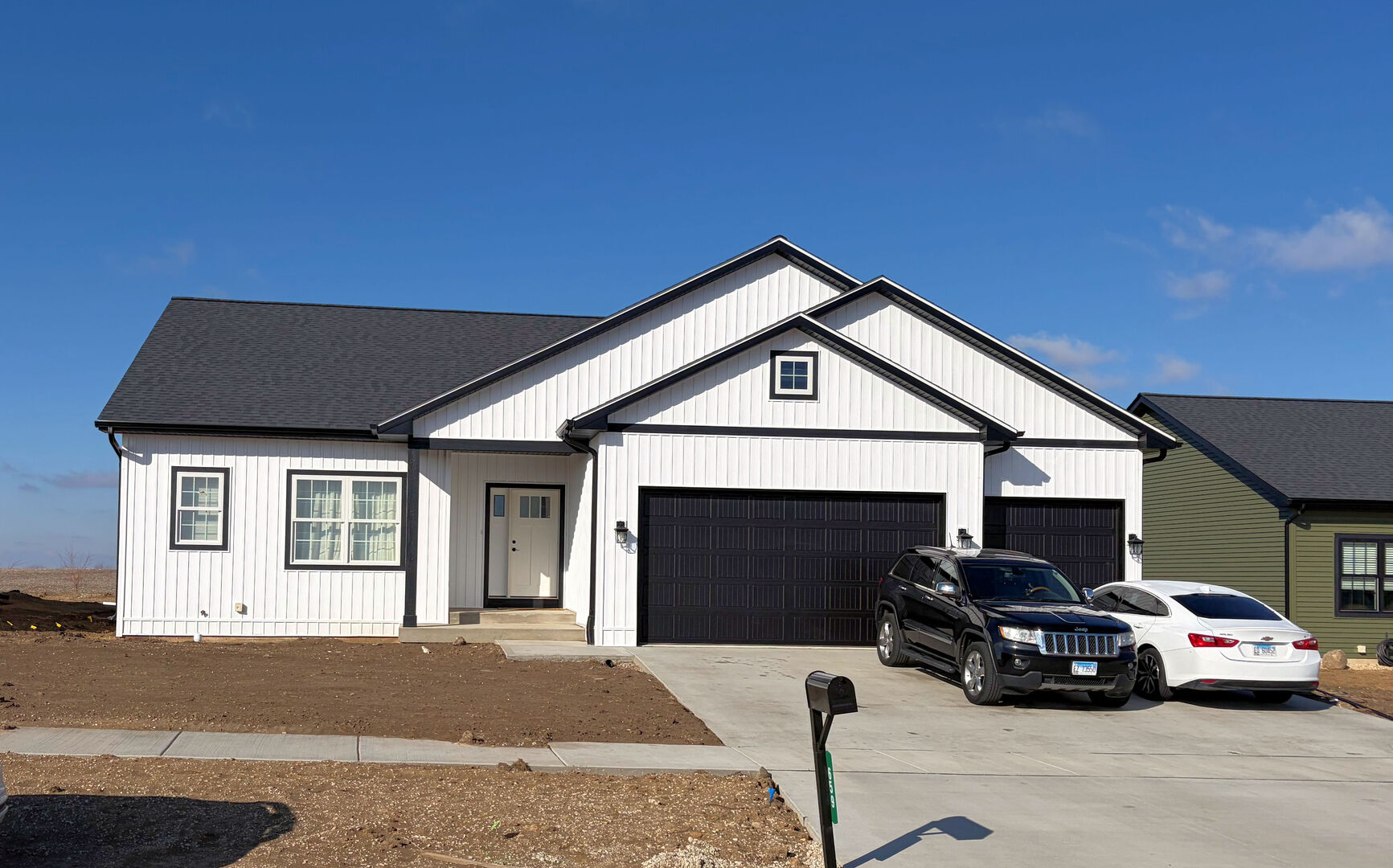 a car parked in front of a house