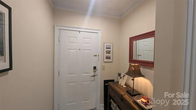a room with furniture and mirror