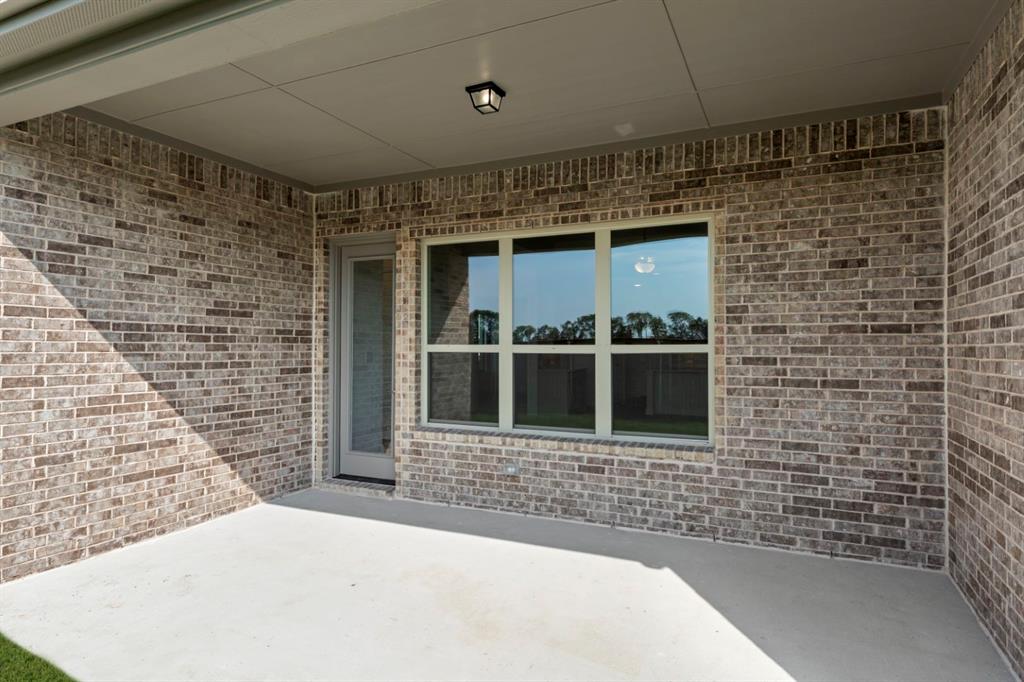 1442 Canadian Lane Van Alstyne, TX 75495 - Photo 25 of 28 24_25. 1442 Canadian - Patio