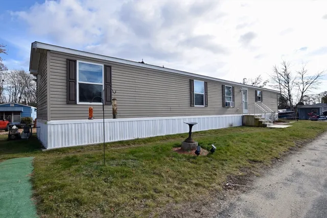 a house view with a backyard space
