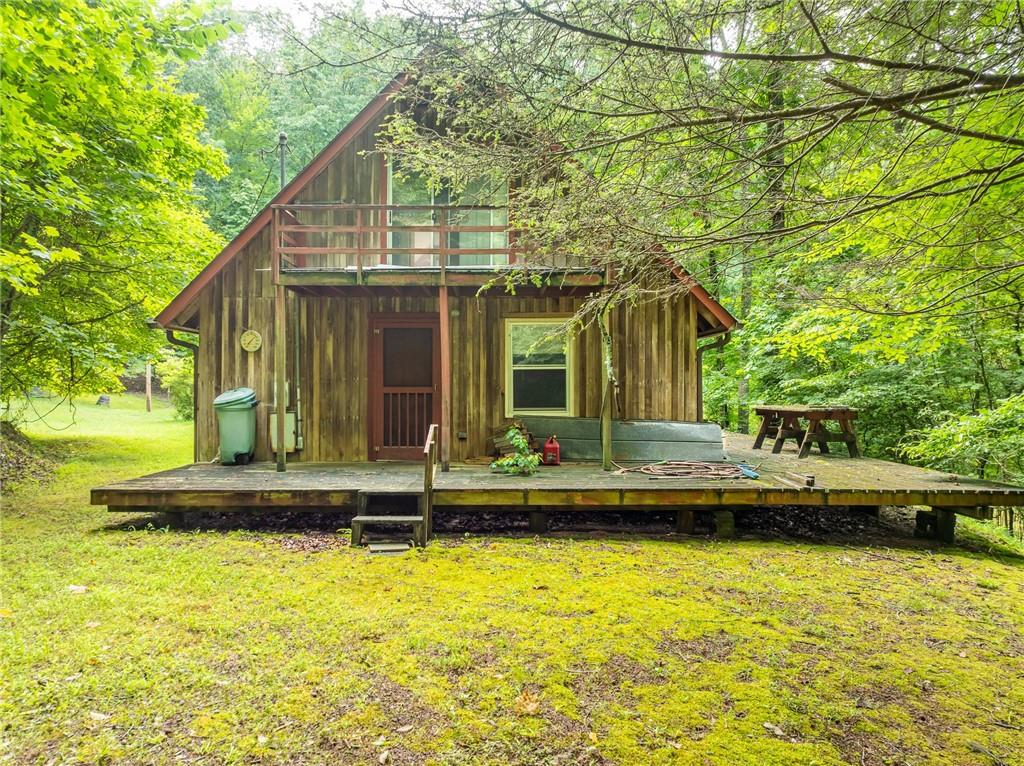 467 Gilliam Road Mineral Bluff, GA 30559 - Photo 20 of 36 a view of a house with pool