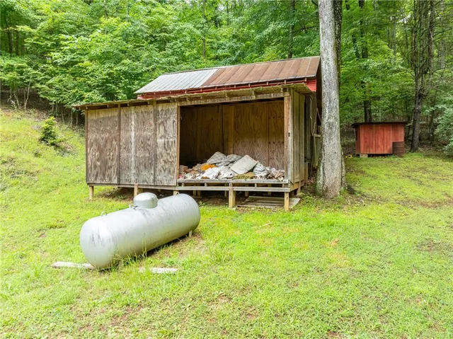 a backyard of a house with seating space