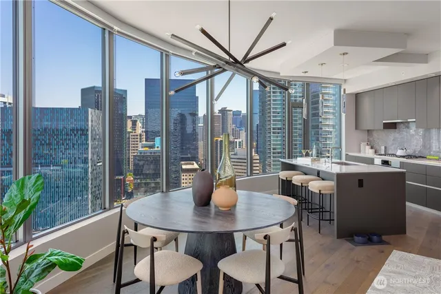 a view of a dining room with furniture window and outside view
