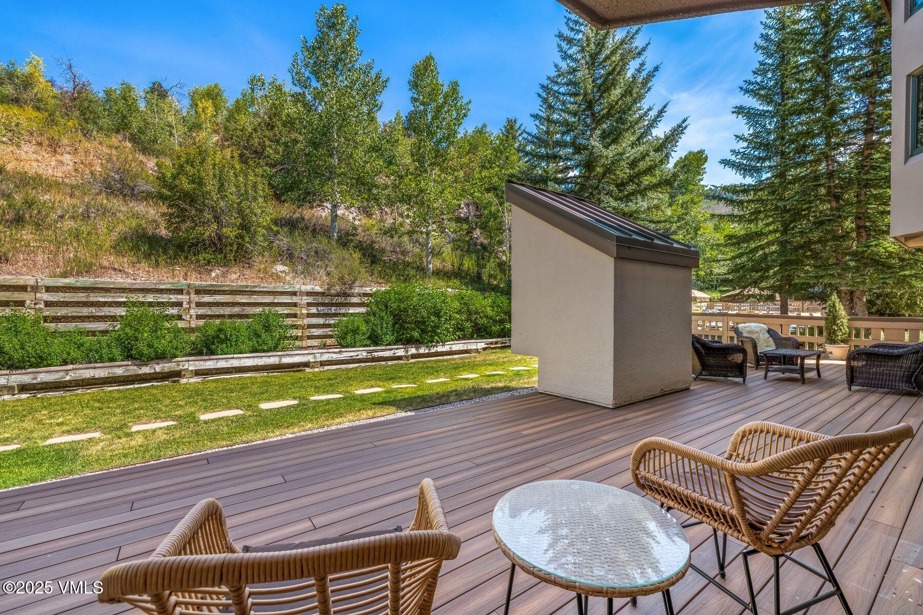 311 Offerson Road, Unit 232 Beaver Creek, CO 81620 - Photo 2 of 42 a view of swimming pool with outdoor seating and yard in the back