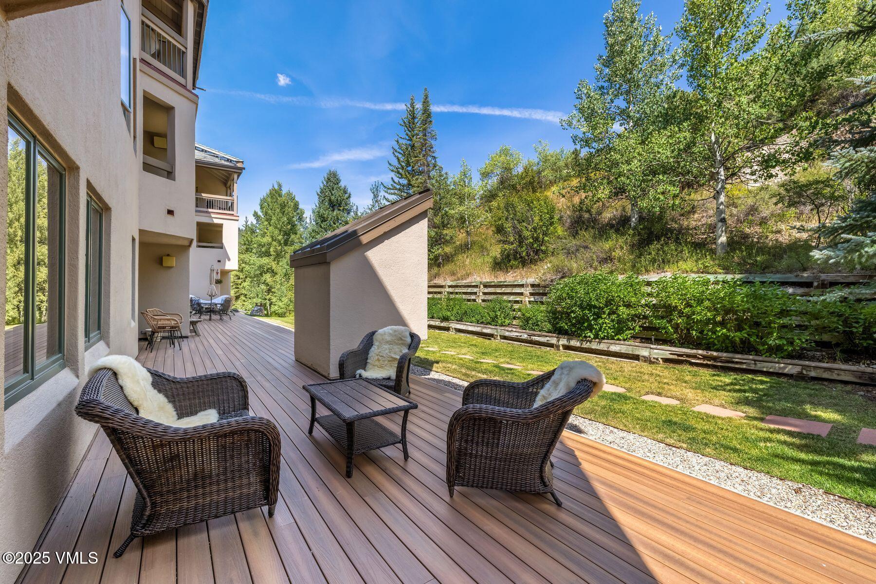 311 Offerson Road, Unit 232 Beaver Creek, CO 81620 - Photo 23 of 42 a view of swimming pool with outdoor seating and plants