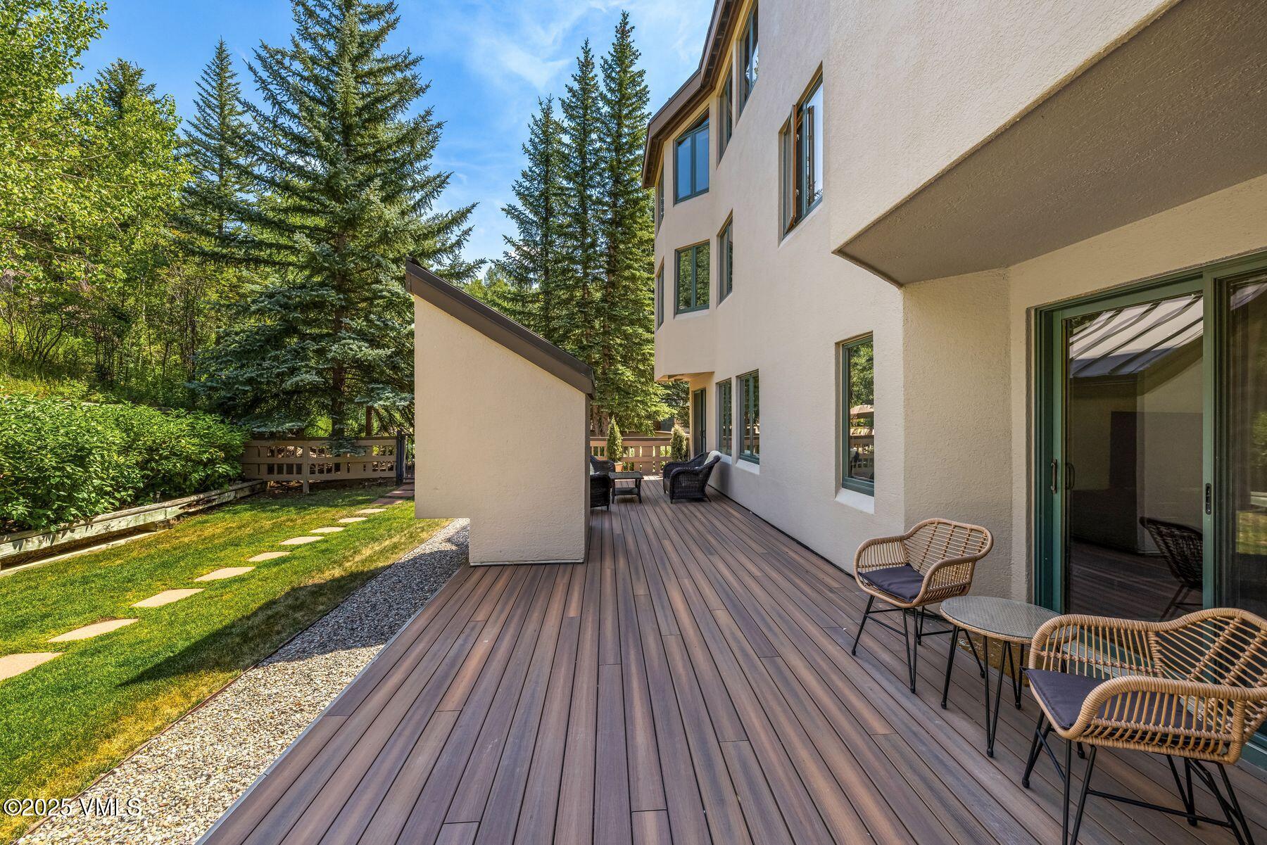 311 Offerson Road, Unit 232 Beaver Creek, CO 81620 - Photo 24 of 42 a view of balcony with two chairs and wooden floor