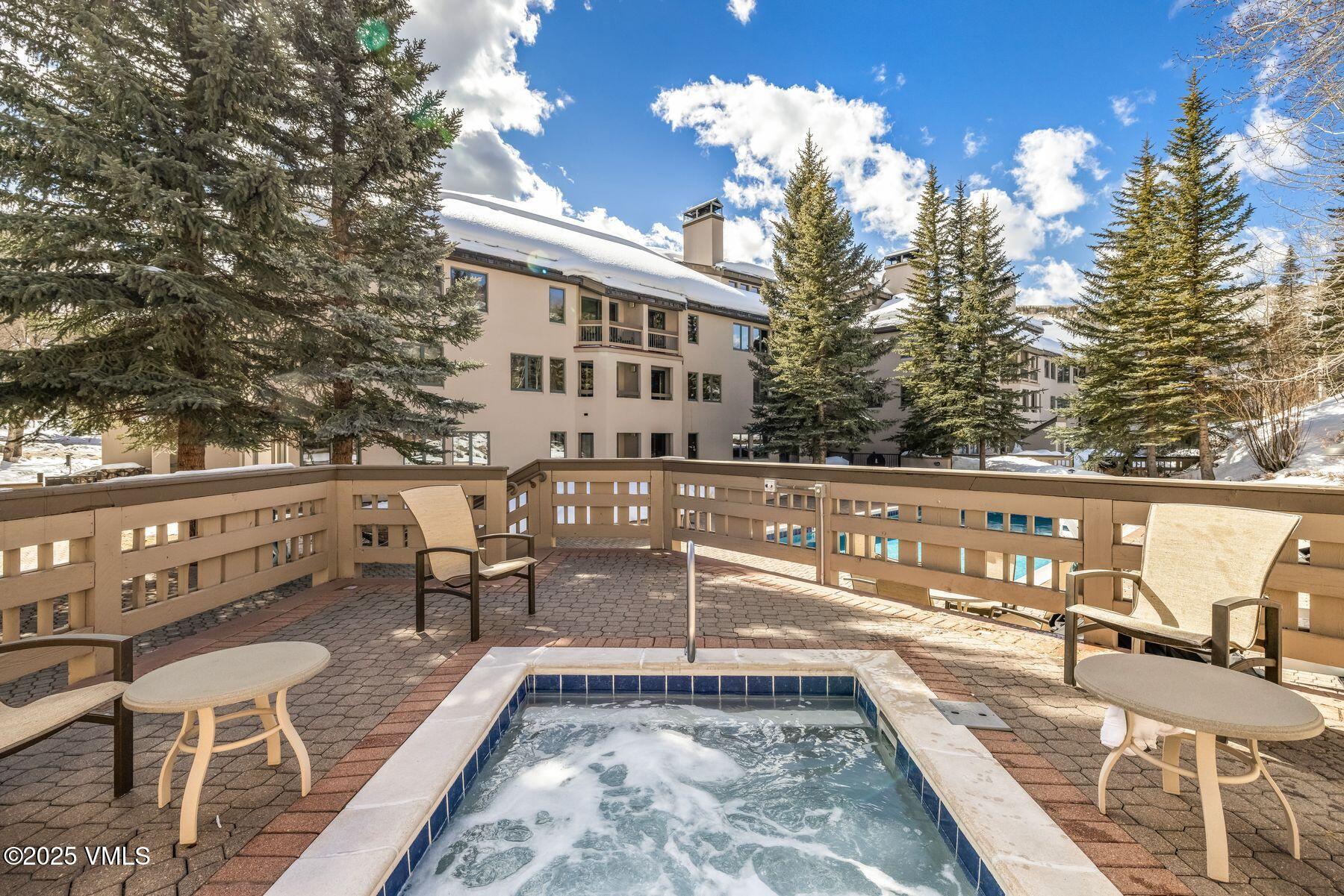 311 Offerson Road, Unit 232 Beaver Creek, CO 81620 - Photo 29 of 42 a view of a chairs and table on the balcony