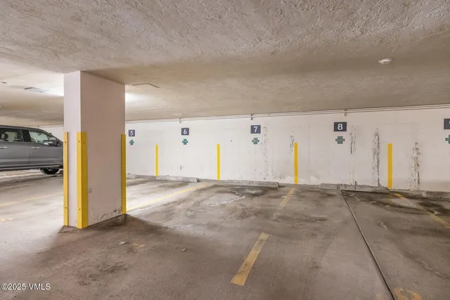 a view of a yard covered with snow in the background