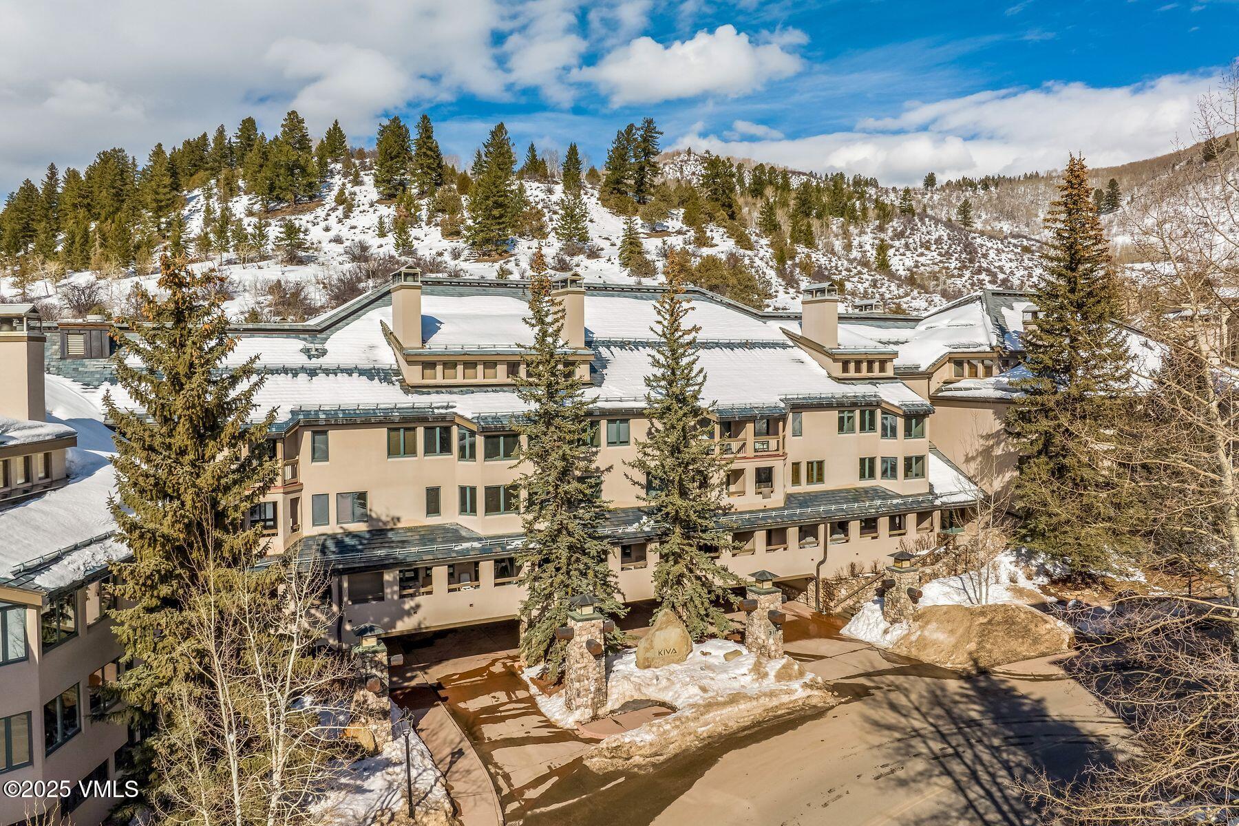 311 Offerson Road, Unit 232 Beaver Creek, CO 81620 - Photo 37 of 42 a view of a large building with a outdoor space