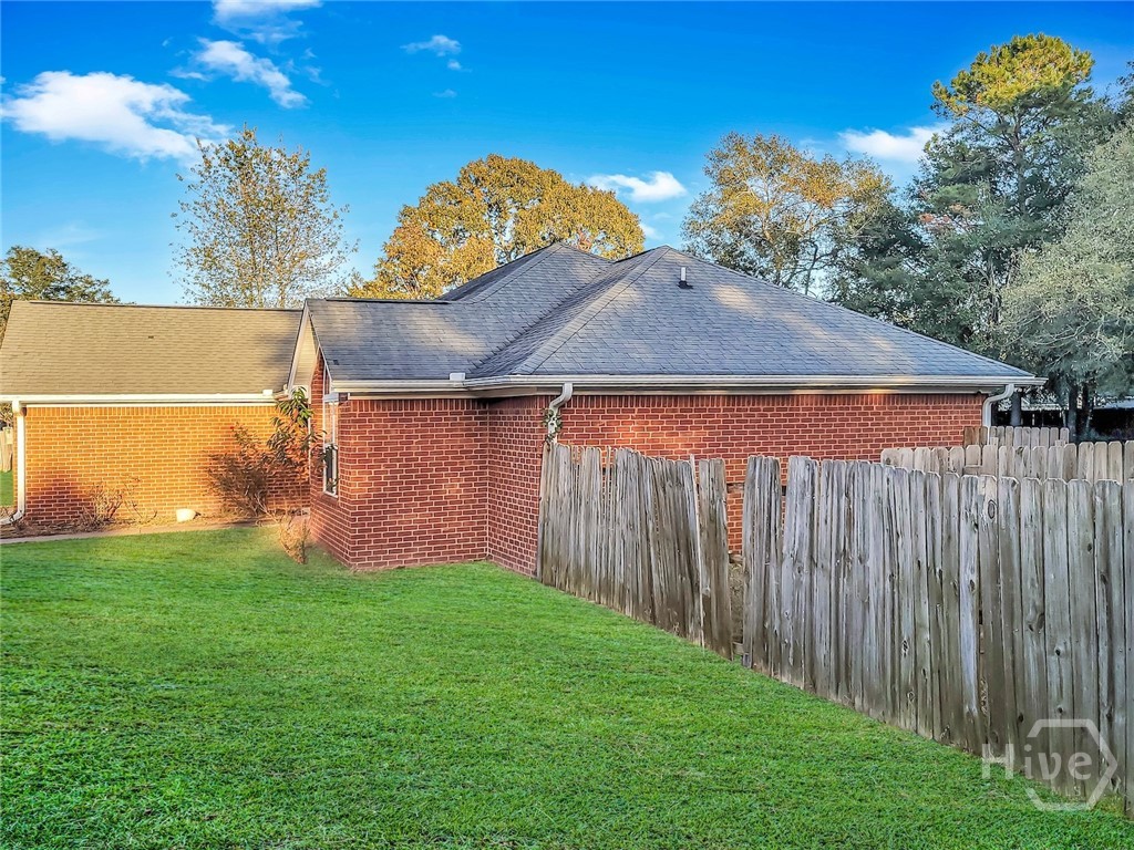 411 Oak Lane Rincon, GA 31326 - Photo 4 of 43 Right Side of The Home