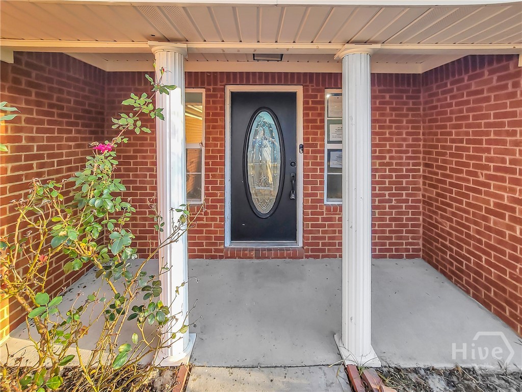 411 Oak Lane Rincon, GA 31326 - Photo 9 of 43 Property Pathway to Front Door