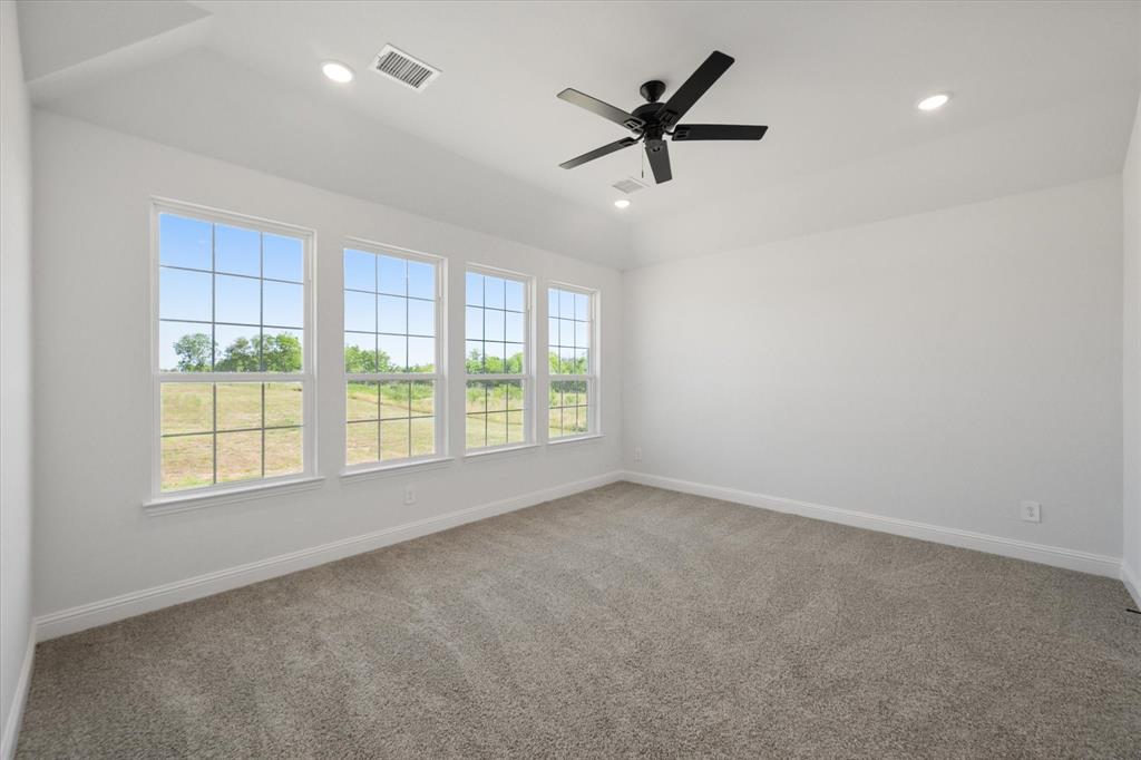 3400 Dobbins Road Corsicana, TX 75110 - Photo 18 of 40 a view of a livingroom with a ceiling fan and window