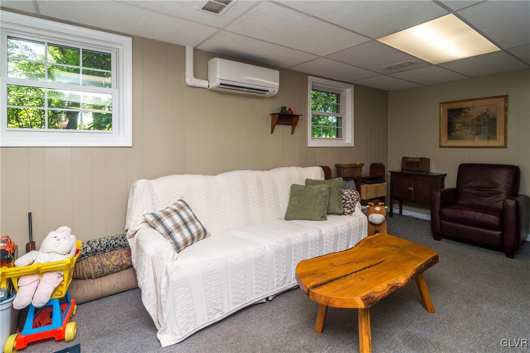 4127 Lower Saucon Road Hellertown, PA 18055 - Photo 15 of 28 a living room with furniture and a window