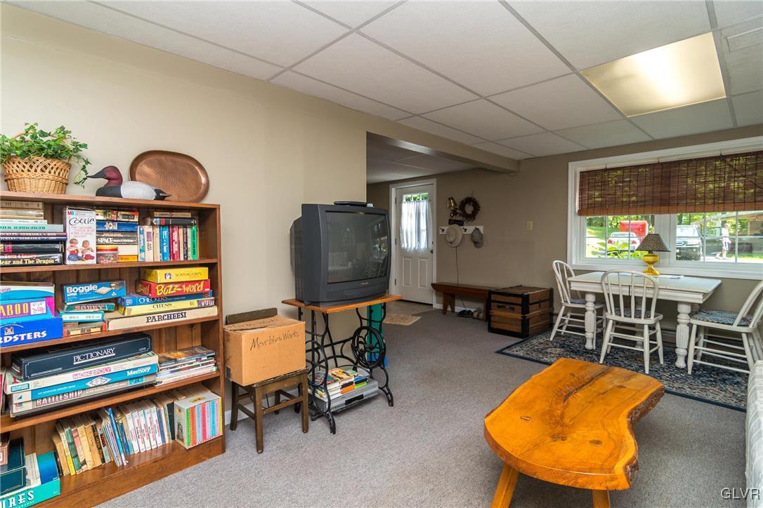 4127 Lower Saucon Road Hellertown, PA 18055 - Photo 16 of 28 a room with furniture gym equipment and a window