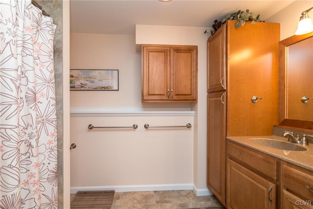 4127 Lower Saucon Road Hellertown, PA 18055 - Photo 19 of 28 a bathroom with a sink and a mirror