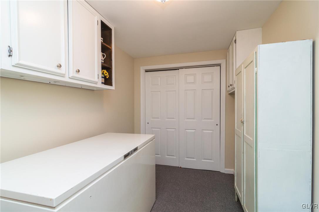 4127 Lower Saucon Road Hellertown, PA 18055 - Photo 21 of 28 a utility room with dryer and washer