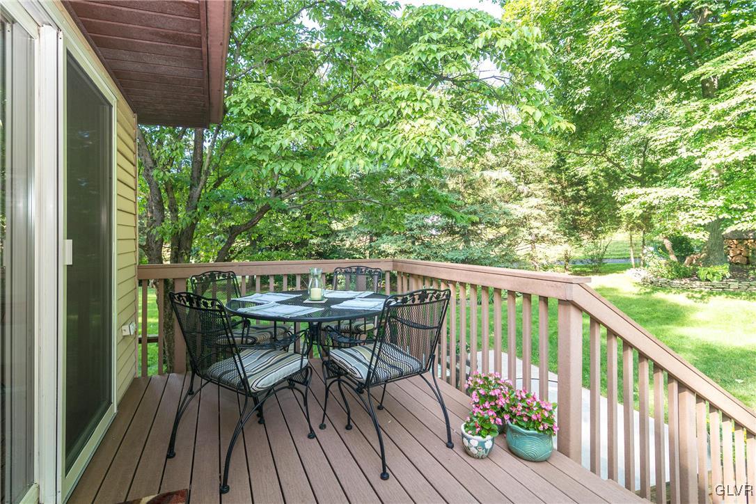 4127 Lower Saucon Road Hellertown, PA 18055 - Photo 22 of 28 a view of a deck with furniture and wooden deck