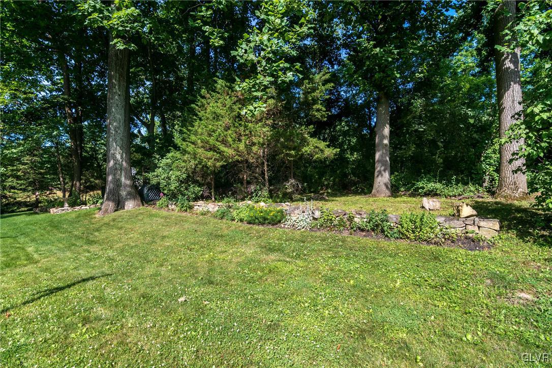 4127 Lower Saucon Road Hellertown, PA 18055 - Photo 25 of 28 a view of outdoor space with a garden