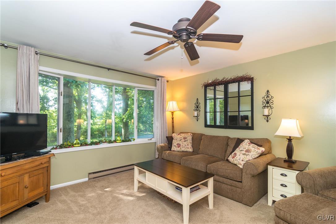 4127 Lower Saucon Road Hellertown, PA 18055 - Photo 4 of 28 a living room with furniture and a flat screen tv