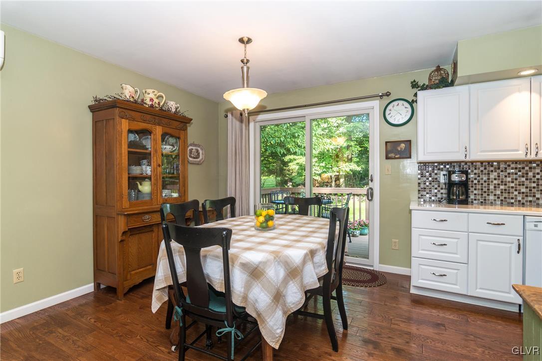 4127 Lower Saucon Road Hellertown, PA 18055 - Photo 6 of 28 a dining room with furniture a chandelier and wooden floor