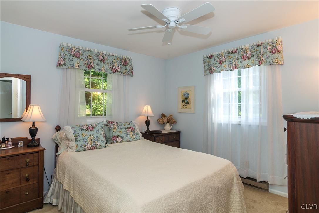 4127 Lower Saucon Road Hellertown, PA 18055 - Photo 10 of 28 a bedroom with a bed and a window