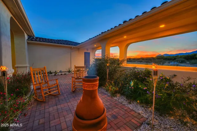 a view of a yard with an outdoor space