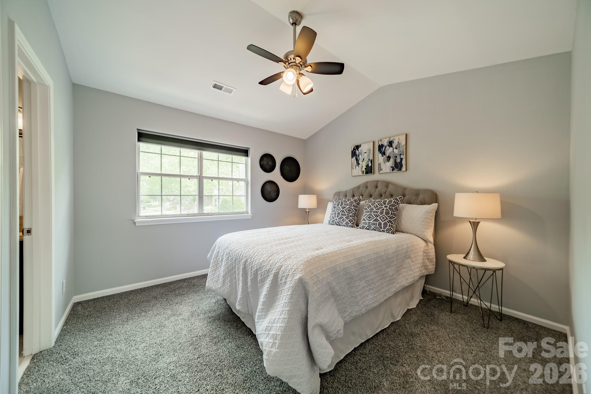 9226 Four Mile Creek Road Charlotte, NC 28277 - Photo 26 of 39 a bedroom with a bed and window