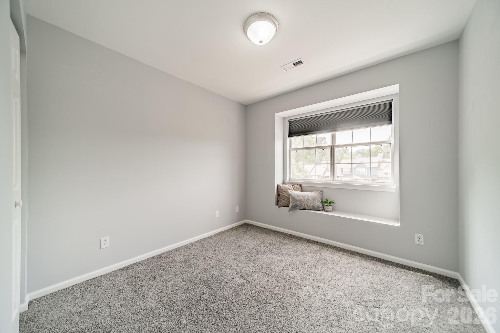 9226 Four Mile Creek Road Charlotte, NC 28277 - Photo 29 of 39 an empty room with a window