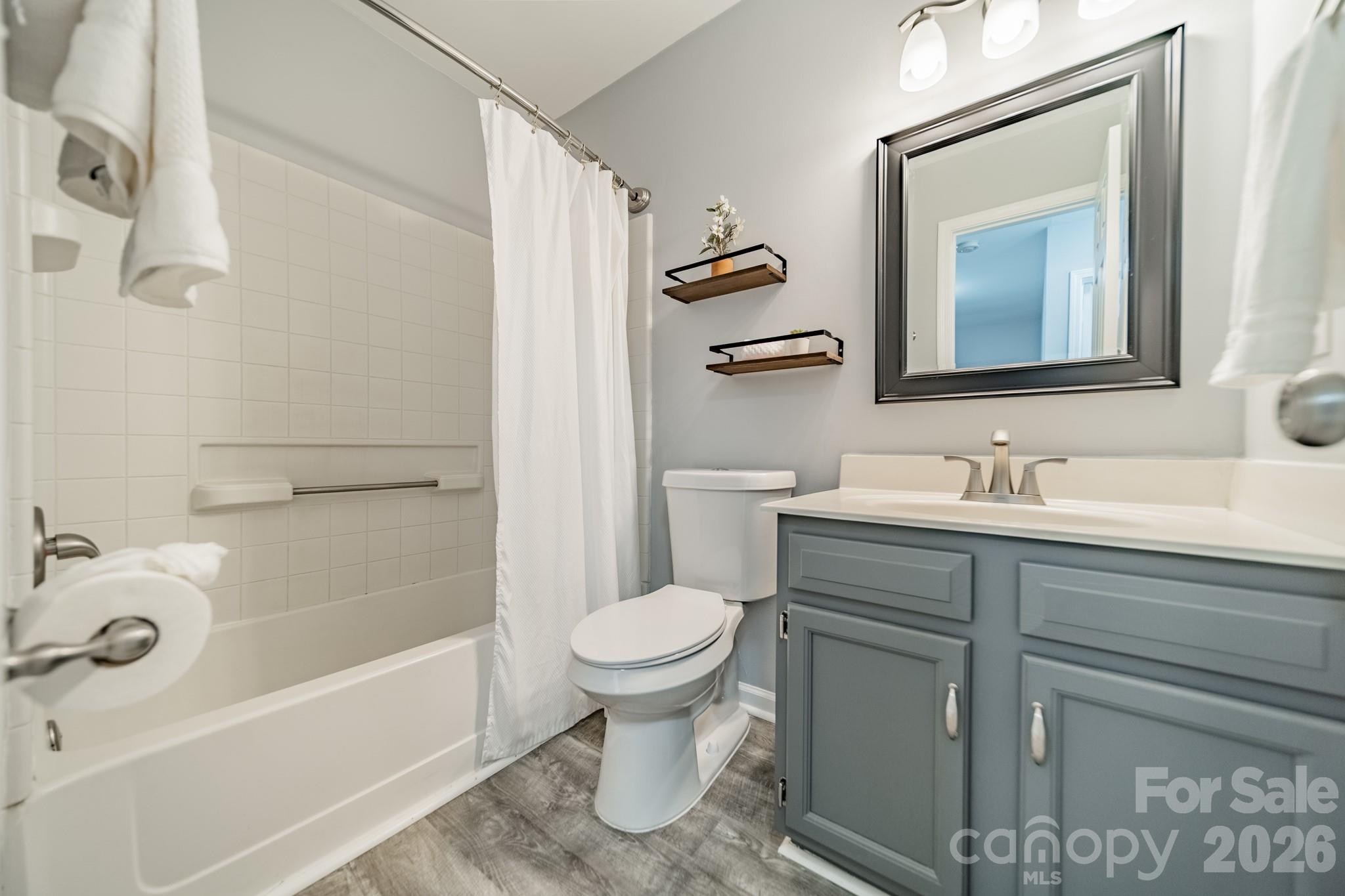 9226 Four Mile Creek Road Charlotte, NC 28277 - Photo 31 of 39 a bathroom with a sink toilet and shower