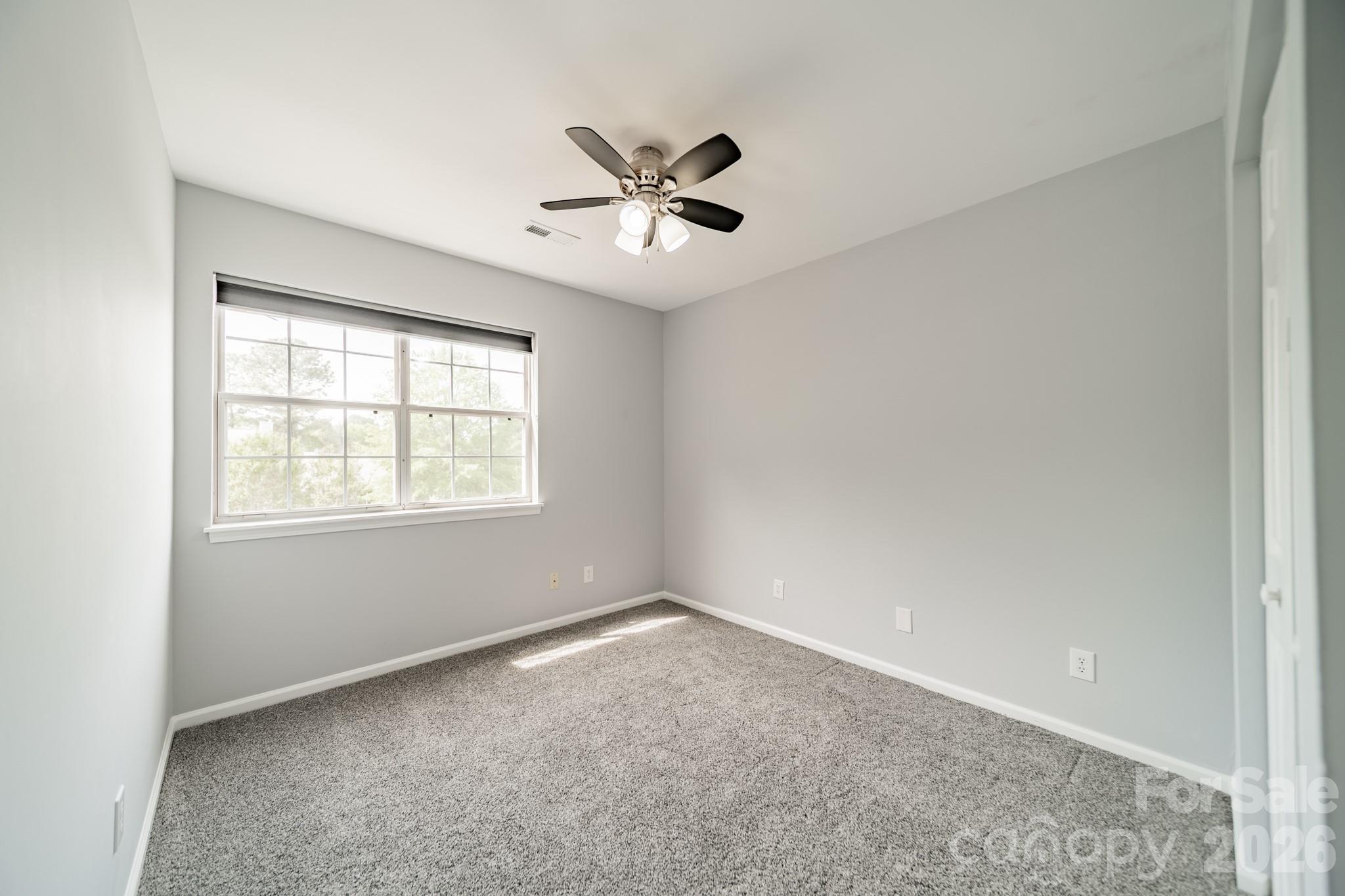 9226 Four Mile Creek Road Charlotte, NC 28277 - Photo 32 of 39 a view of an empty room with a window