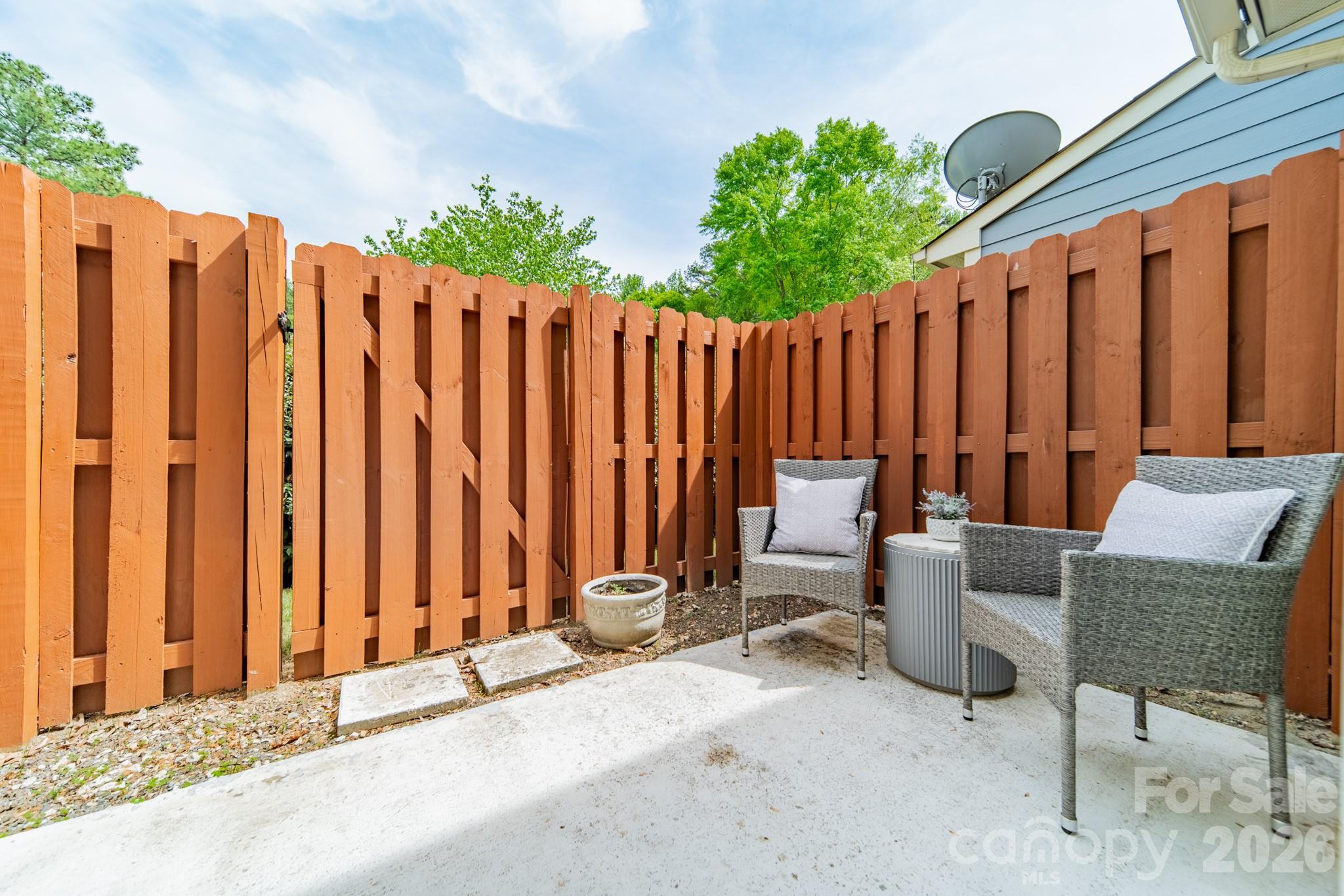 9226 Four Mile Creek Road Charlotte, NC 28277 - Photo 34 of 39 a view of outdoor seating area with wooden fence