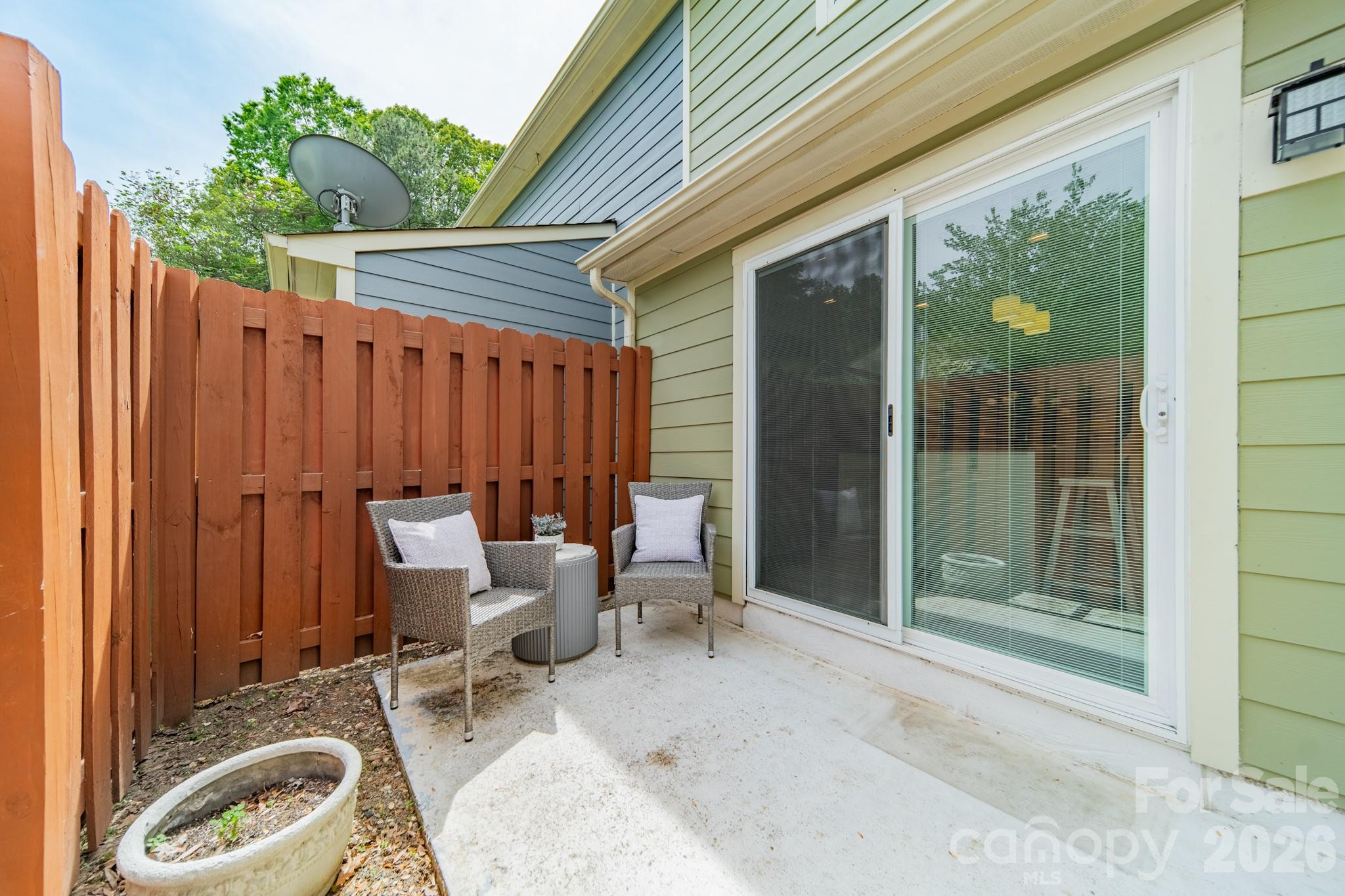 9226 Four Mile Creek Road Charlotte, NC 28277 - Photo 35 of 39 a backyard of a house with yard and outdoor seating