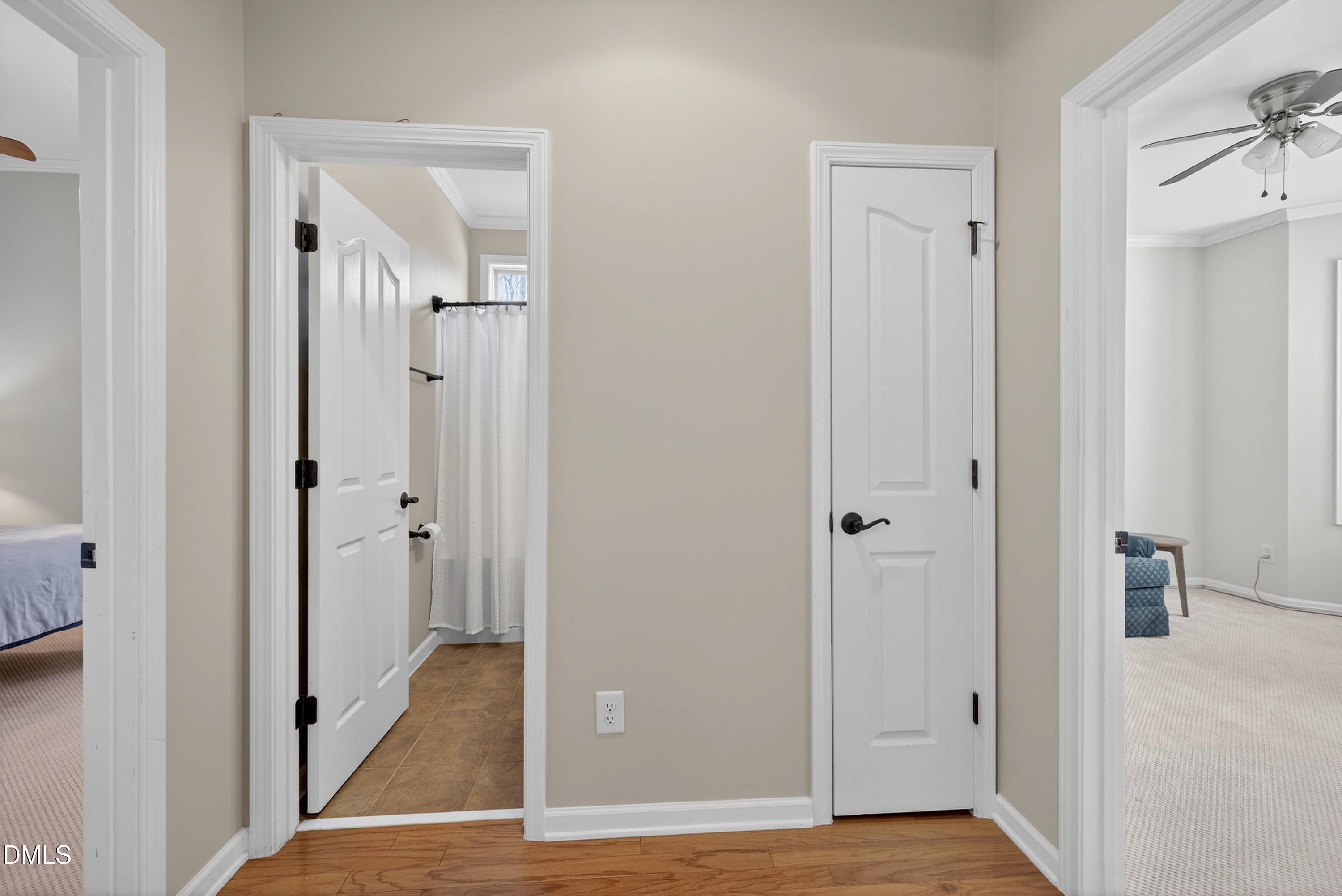 6117 Leesburg Lane Raleigh, NC 27617 - Photo 26 of 39 Foyer to Full Bath & Secondary Bedrooms
