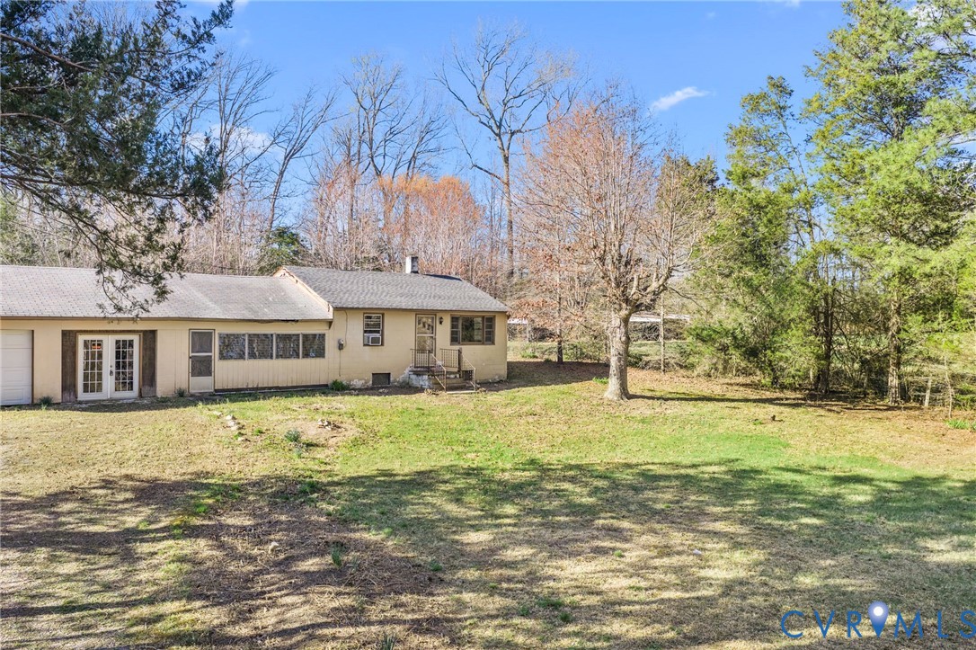 19161 Hollowing Creek Road Beaverdam, VA 23015 - Photo 1 of 27 a front view of a house with a yard