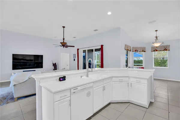 a view of living room with furniture and flat screen tv
