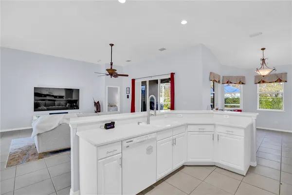 a view of living room with furniture and flat screen tv