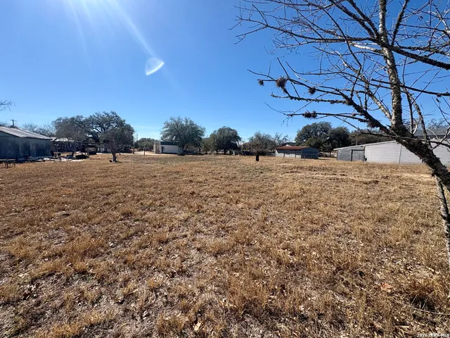 a view of a yard with an outdoor space